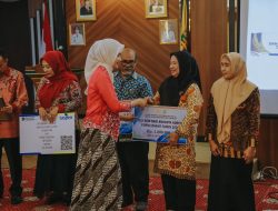 Prosesi Pelepasan Purnabakti Kepala Dinas Perkebunan Provinsi Lampung Berlangsung Khidmat